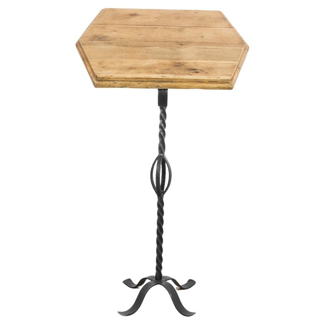 This 1950s Belgian iron book pedestal presents a unique fusion of rustic charm and functional design. The stand, crafted...