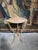 An elegant and highly decorative French guéridon table dating from the early 20th century, featuring a beautifully crafted...