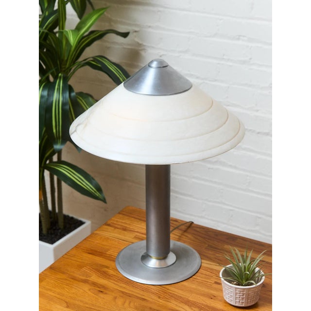 This stunning piece will add a touch of sophistication to any room in your home. The lamp will provide a warm and cozy...