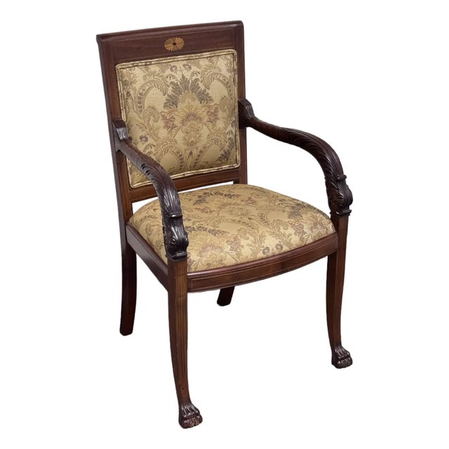 Design Plus Gallery presents a French Empire Accent Chair. The antique chair is made from ornately carved mahogany and is...