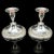 This is a pair of vintage low candlesticks. An English, silver plated candle nozzle, dating to the mid century, circa...