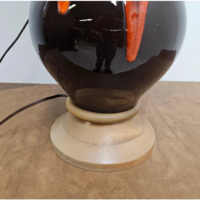 shade not included. Great shape minor wear. Minor crazing in clear coat. Wood base has some fading. Lamp is working. As...