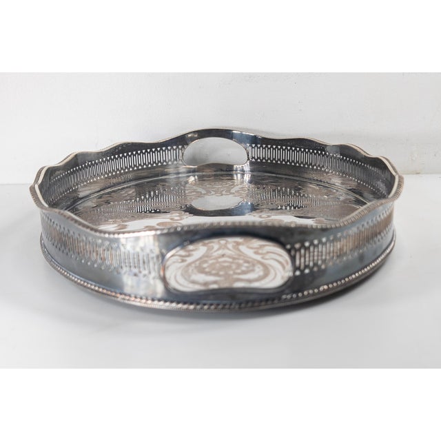 We are selling this nice elegant English Silverplate drinks tray in the Victorian style. This tray has nice engraved...