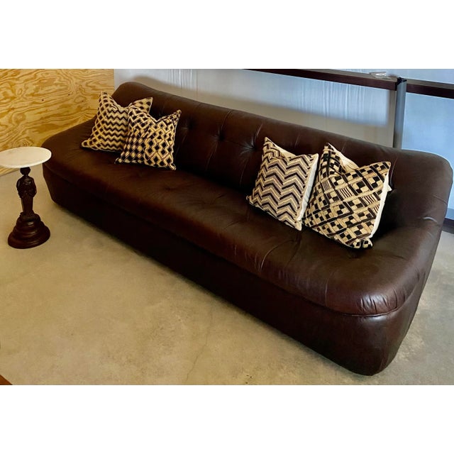 Kuba Shoowa pillows…crafted from a handwoven palm wood raffia from the Democratic Republic of Congo (formerly Zaire). Each...