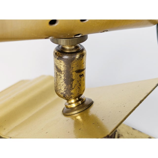 Adjustable clamp spotlight in painted and anodized aluminum and brass. Ideal for illuminating a bookcase, shelf, etc....