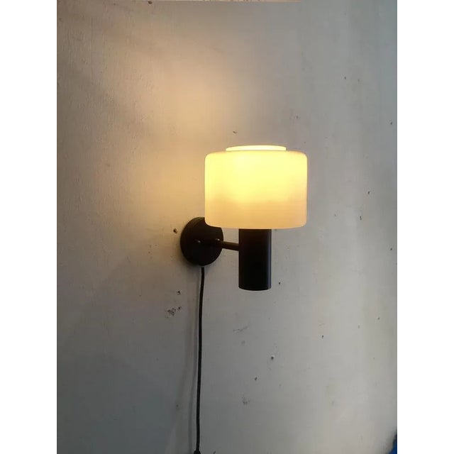 Dutch Wall Lamp from Raak, 1960, in Flawless conditions. Designed 1960 to 1969 This piece is attributed to the mentioned...