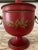 Stunning red urn with decorative gold laurel garland and bow adorning the outside. Nice brass rings on each side and brass...