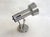 Adjustable wall spotlight with a round base, small tubular stem, and openwork spotlight shade mounted on a ball joint; all...