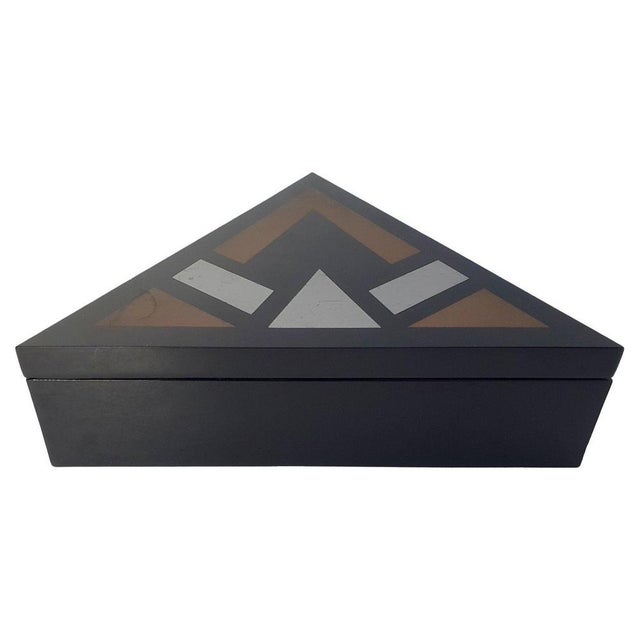 Here we have a unique box in Art Deco style but produced during the late 1960's. The material is black acrylic glass with...