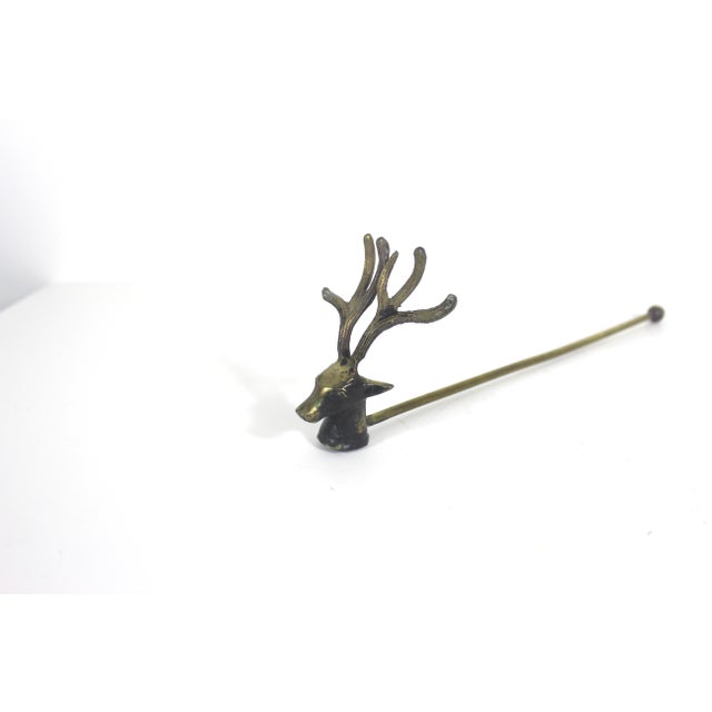 Brass candle snuffer stag with large antlers. Solid brass with nice vintage patina and lots of wax residue. Perfect for...