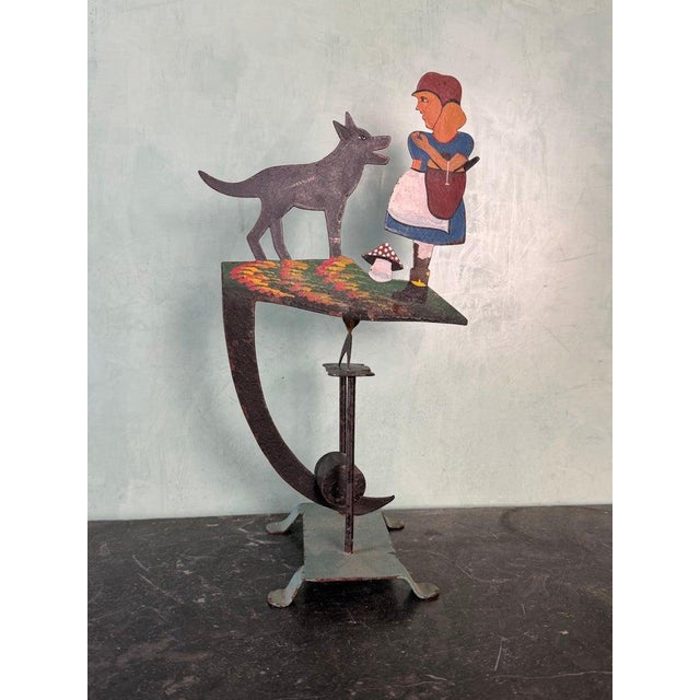 A delightful vintage folk art balancing sculpture depicting the classic tale of Little Red Riding Hood and the Wolf....