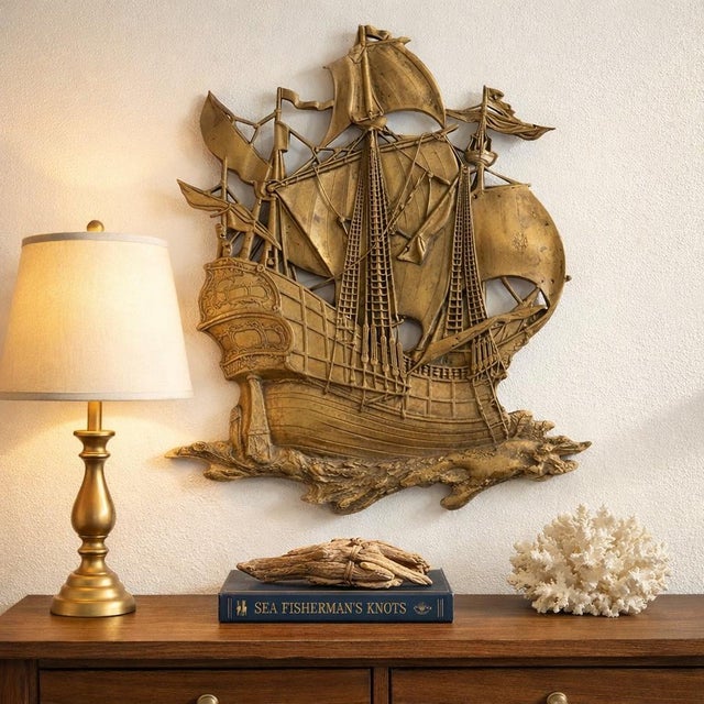This large statement wall sculpture depicting a Spanish galleon sailing ship was produced by Dart Industries in 1968. The...