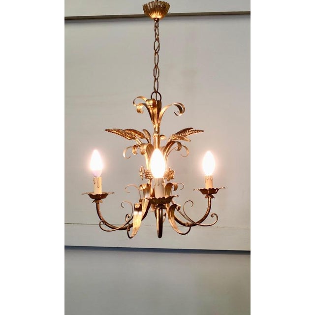 French Toleware Gilded Chandelier This is a very pretty 3 branch Harvest light, it is decorated with curled leaves and...