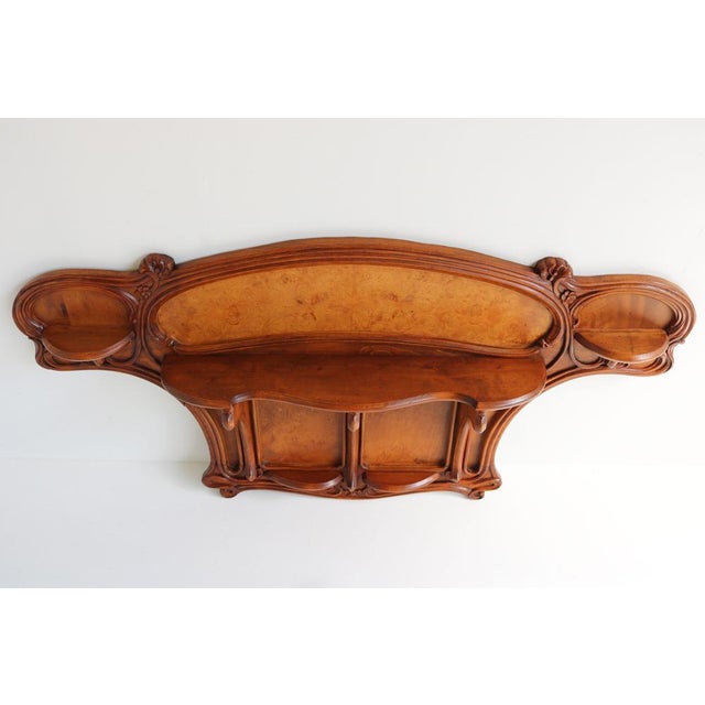 This French Art Nouveau wall shelf designed by art nouveau grandmaster Eugene Gaillard circa 1900. Superb organic design...