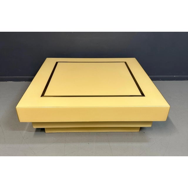 Mid-Century Modern 1970s Acrylic Stepped Cream Colored Coffee Table With Brass Ribbon Inlay For Sale - Image 3 of 10