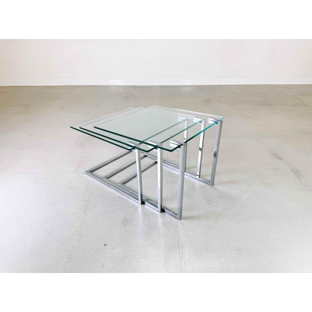 We are offering for sale three beautiful mid-century nesting tables from the design institute america (dia) designed by...