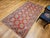 19th Century Khotan Rug in Allover Geometric Pattern in Red, Lavender, Ivory, Green For Sale - Image 4 of 16