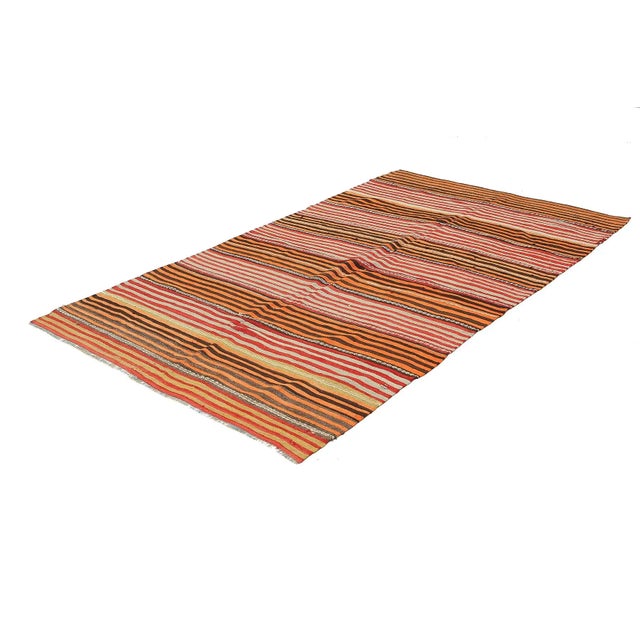 Handwoven vintage striped kilim rug from Denizli region of Turkey. Approximatelly 45-55 years old. In very good condition.