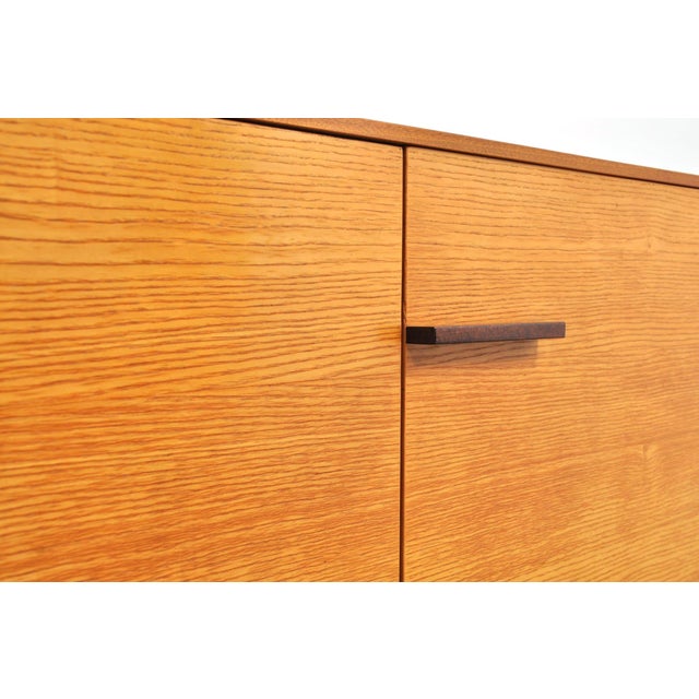 Stylish and sleek design! 1960s. The black wooden base combines beautifully with the warm tone of the wood (ash and...