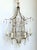 This spectacular vintage chandelier captures the essence of Chinoiserie elegance with its dramatic pagoda-inspired...