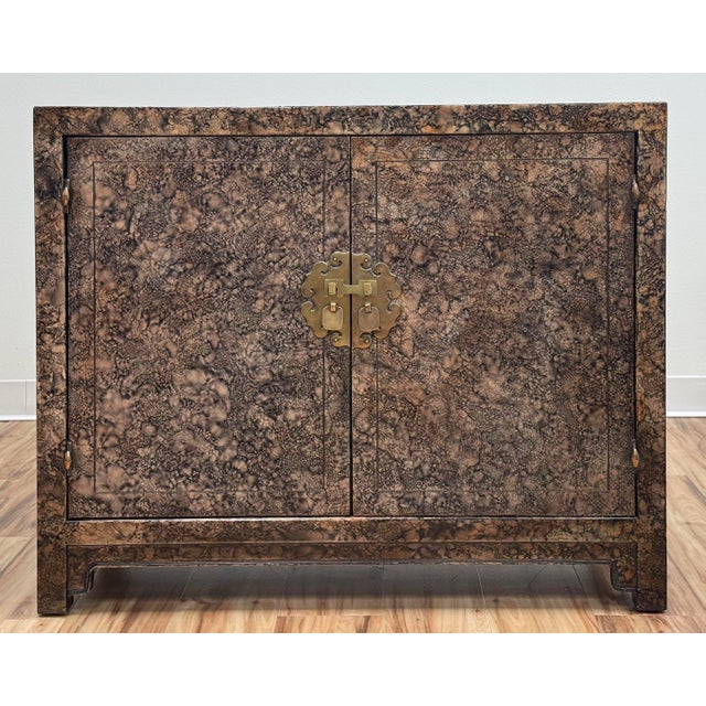 Stylish vintage 1970's era Henredon cabinet with decorative Asian motif brass hardware and oil drop faux tortoise shell...