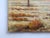 Small mid 20th century oil on canvas over cardboard painting of palm trees in the desert. Unsigned. Unframed, darkening to...