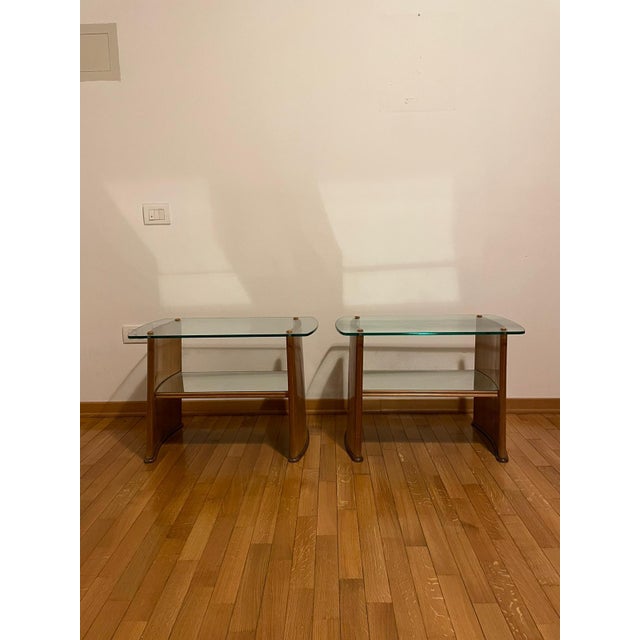 Pair of 1940s bedside tables in excellent condition and intact, made of wood and cut and mirrored glass, attributed to...