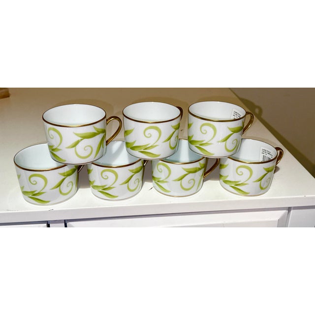 Set of 7 Cups and Saucers, Frivole by Bernardaud, French, Limoges A pristine set of seven flat cups and saucers from...