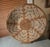 African coil weave trays from Zambia. The tray can be wall-art or serving tray. Geometrical Sunburst pattern. 17" diameter...