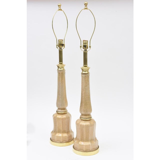 Offering to you is a stunning vintage obscure and rare pair of French Maison Bagues tall table lamps fully restored. They...