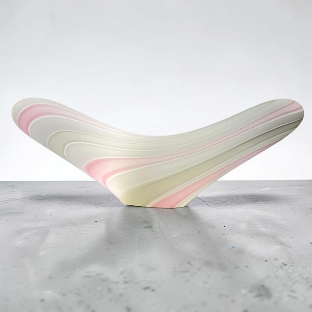This single light graceful crescent shaped lamp in opaque white with pink and grey swirled decoration is an impressive...