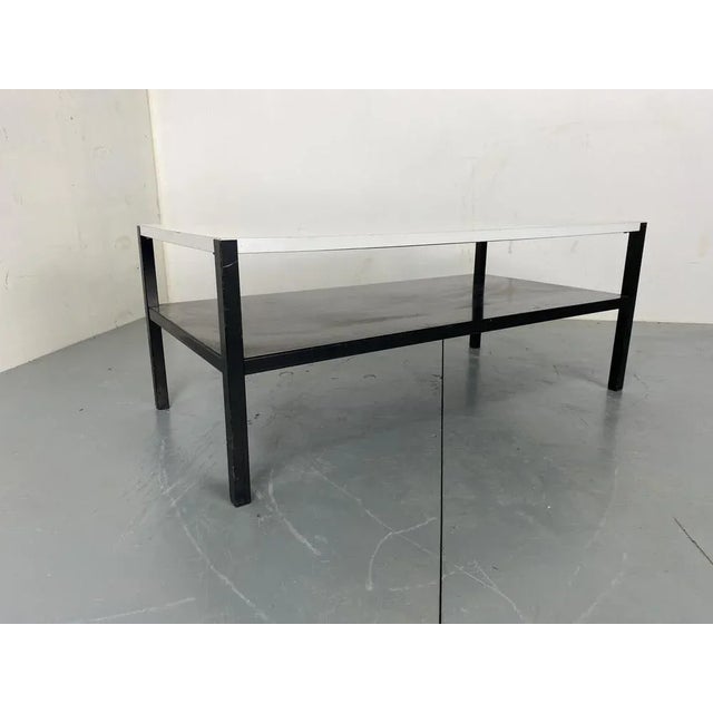 Mid Century Modernist coffee table, model Regal, designed by Wim Rietveld in 1960 for Ahrend de Cirkel. It has a black...