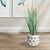 A repeated vine pattern adorn this set of pots. They are just the perfect vessels for lush greens or a tailored orchid....