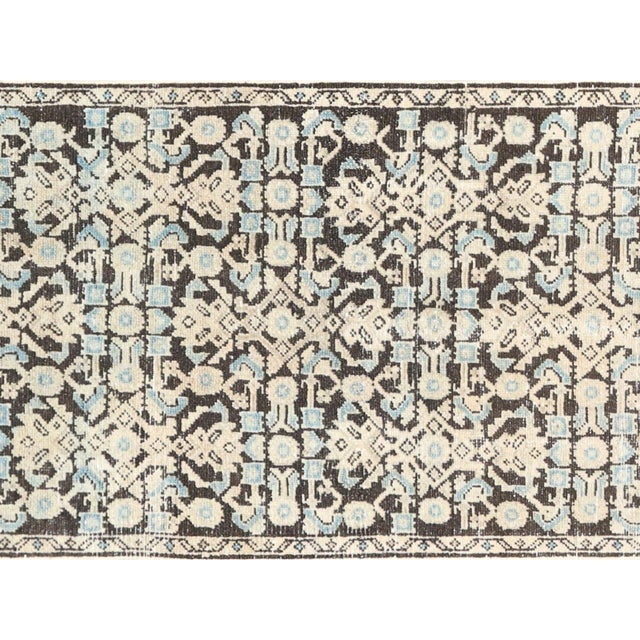 This Semi-Antique Persian Melayer Runner boasts a size of 2'7" x 12'5", making it perfect for long hallways or large...