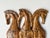 This striking vintage Frederic Weinberg - style wall sculpture features three Etruscan horses crafted from a composition /...