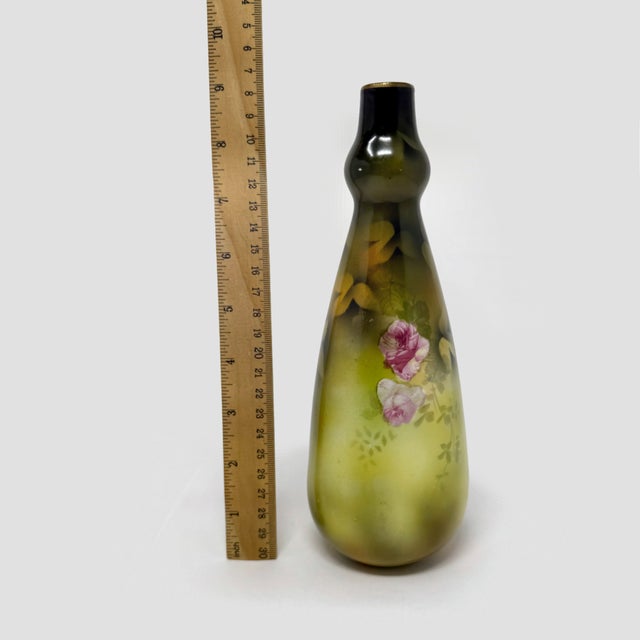 Up for sale is a stunning, authentic antique RS Prussia porcelain vase. Standing at 9 inches tall, this elegant piece...