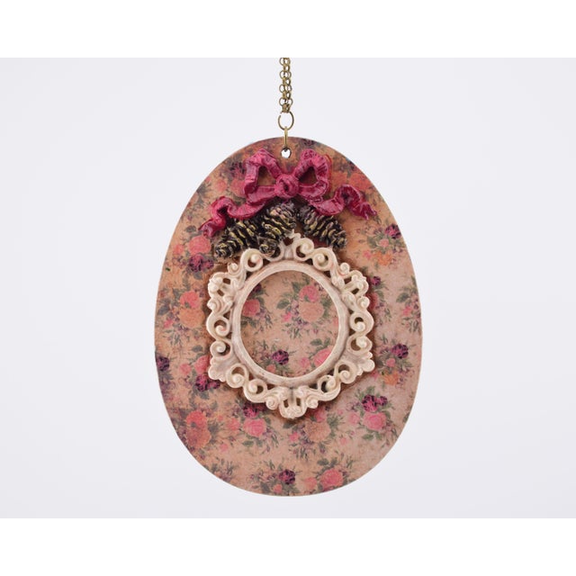 This rustic/romantic-style Christmas ornament has been handcrafted and hand-painted. The materials used in its creation...