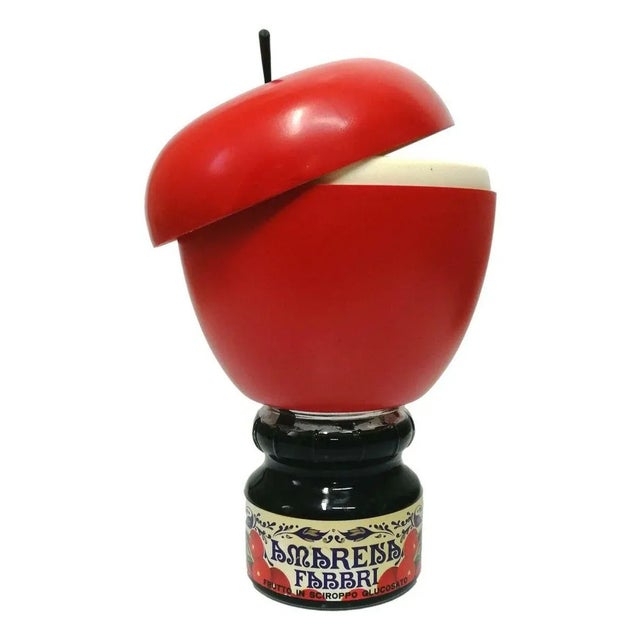 original and undamaged black cherries in syrup from the 60s, with an unusual upper plastic cookie holder in the shape of a...