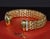 Authentic vintage FOPE Flex'it solid 18K yellow and white gold natural diamond open cuff bangle bracelet. This exceptional...