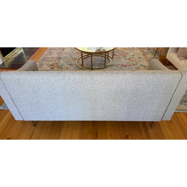 Custom-designed West Elm Olive 71" Sofa with brass metal legs. Channel back, swoop arms. Pearl Gray Deco Weave fabric....