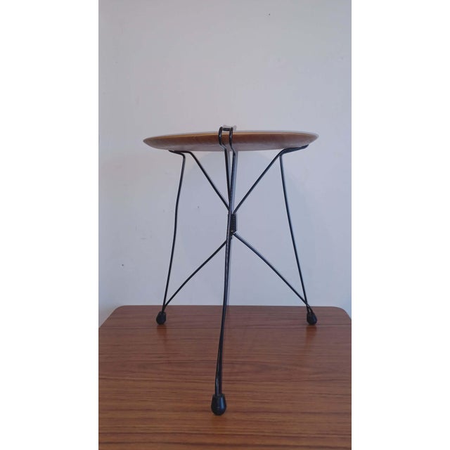 Mid-Century Plant Stand, 1950s/60s Teak and wire. Folding stand. Scratches/plastic chips on the underside (see photo)....