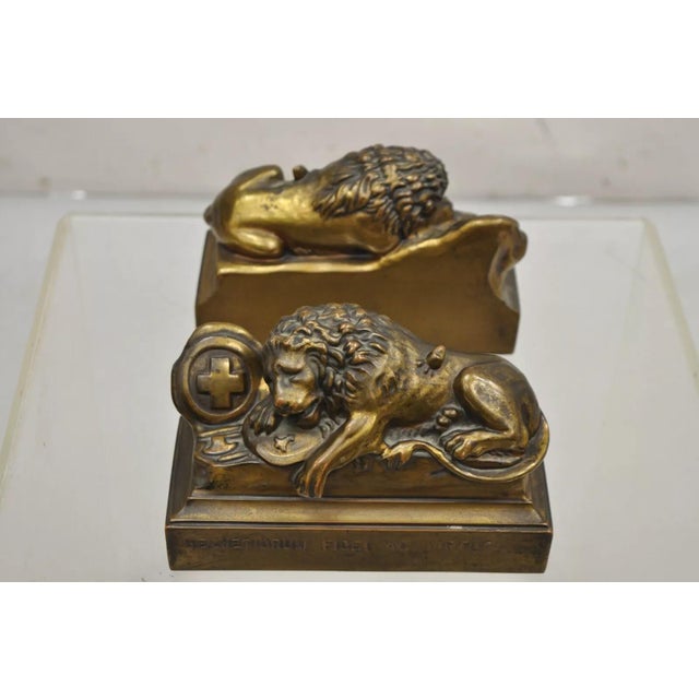 Antique Swiss Guard Bronze Finish Lion Bookends "Helvetiorum Fidei AC Virtuti" Marked JB 1570 to Rear. Circa Early 20th...