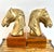 Striking and substantial pair of vintage brass horse head bookends mounted on solid wood bases. Marked “Dolbi-Cashier 1980...