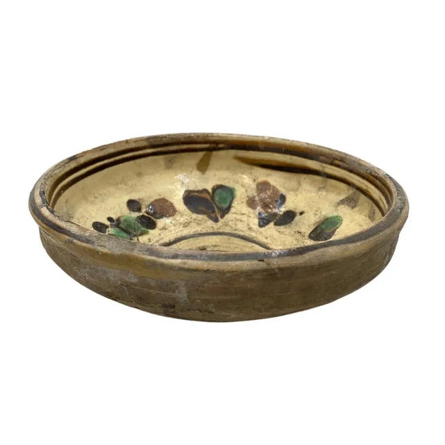 This antique terra cotta decorative bowl from Hungary is a wonderful addition to any Farmhouse decor. The rustic piece...