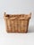 This vintage wicker basket offers timeless charm and practical storage. Handwoven with a classic design, it is sturdy yet...