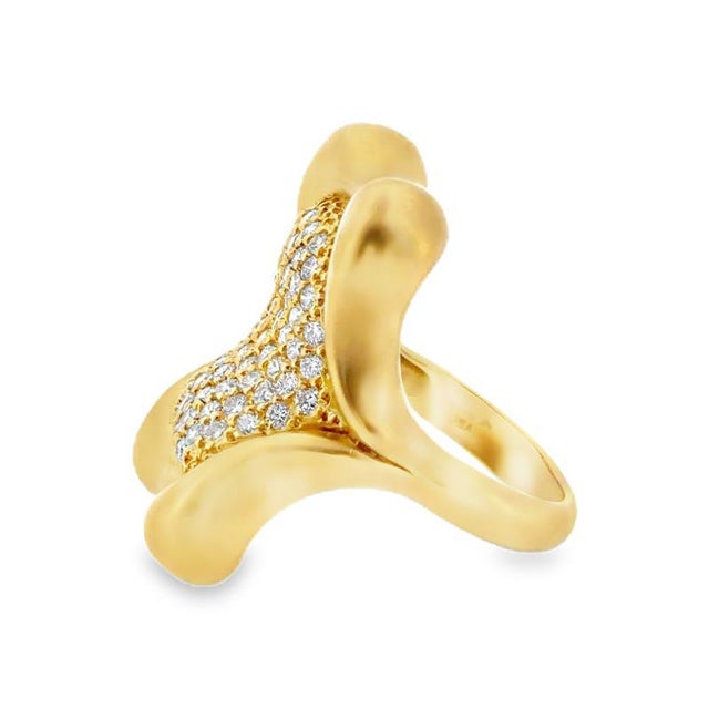 Donald Huber 18K yellow gold pave' diamond statement ring with satin finish. The ring's unique design reflects meticulous...