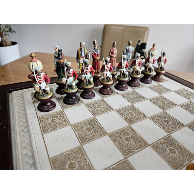 Franklin Mint Paradise collectible chess sets. The decorative chess set consists of a wooden mahogany box and a chessboard...