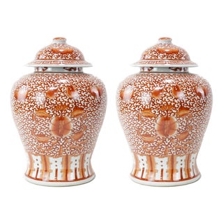 Pair of Chinese Late 19th - Early 20th Century Jingdezhen Kiln Iron Red Glaze 'Lotus Scroll' Covered Jars For Sale