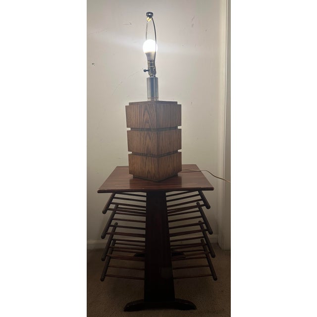 A beautiful vintage 3 -tier stacked square design with horizontal grooves that divide the walnut wooden base into three...