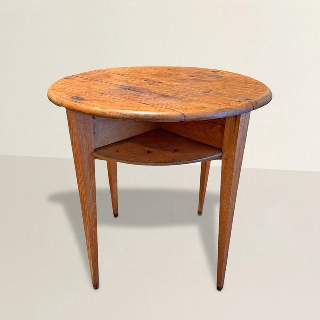 Pulled from the corner of an English pub, this late 19th–early 20th century pine table feels steeped in the rituals of...